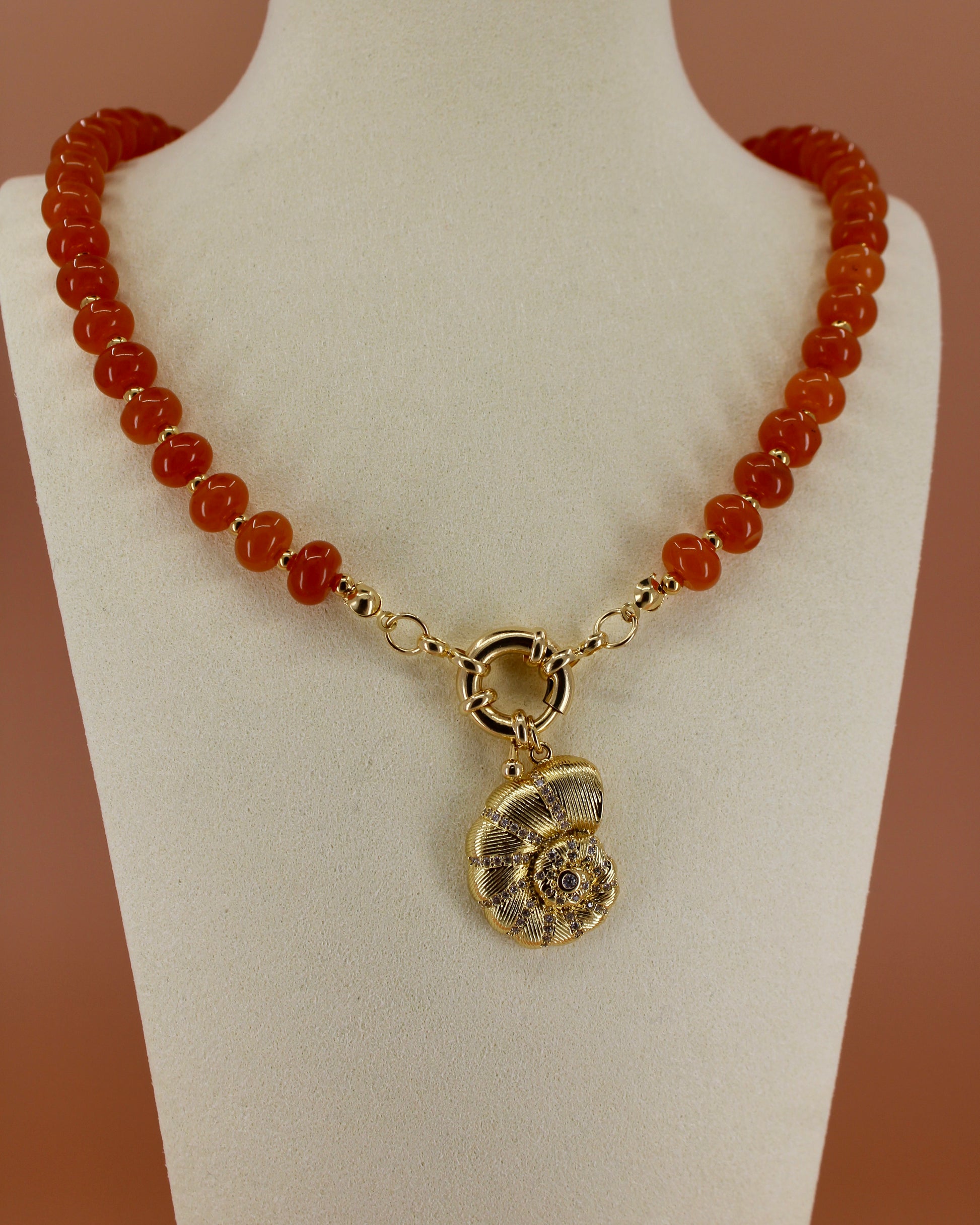 Handmade beaded necklaces in navy blue, green, yellow and orange with gold sailor clasps for interchangeable charms, customizable coastal jewelry by Cuya.