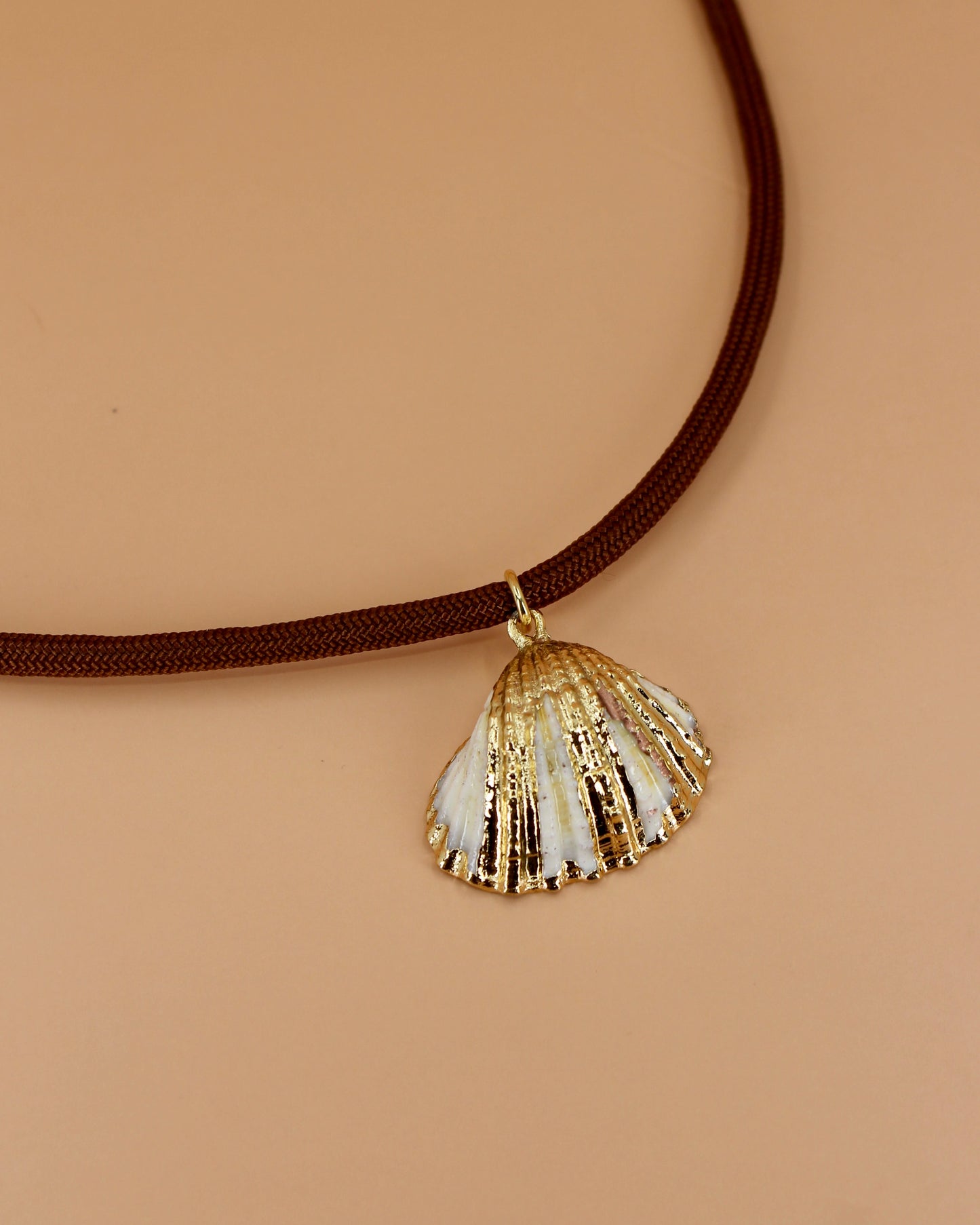 Handmade paracord necklace with gold shell charm, choose from two pendant options, coastal-inspired jewelry by Cuya.