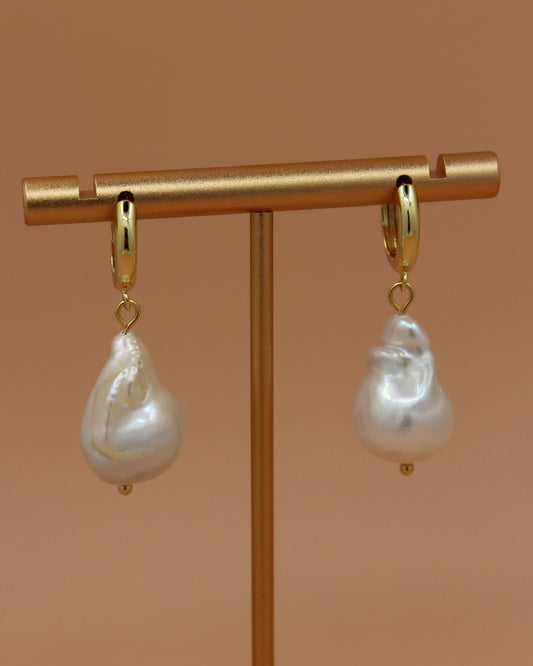 Handmade baroque freshwater pearl earrings on gold hoops, organic coastal jewelry by Cuya.