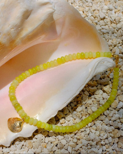 yellow beaded necklace, shell charm necklace, summer statement necklace, beach jewelry handmade, trendy gold charm necklace, layering necklace 2025, coastal accessories, handcrafted jewelry South Florida