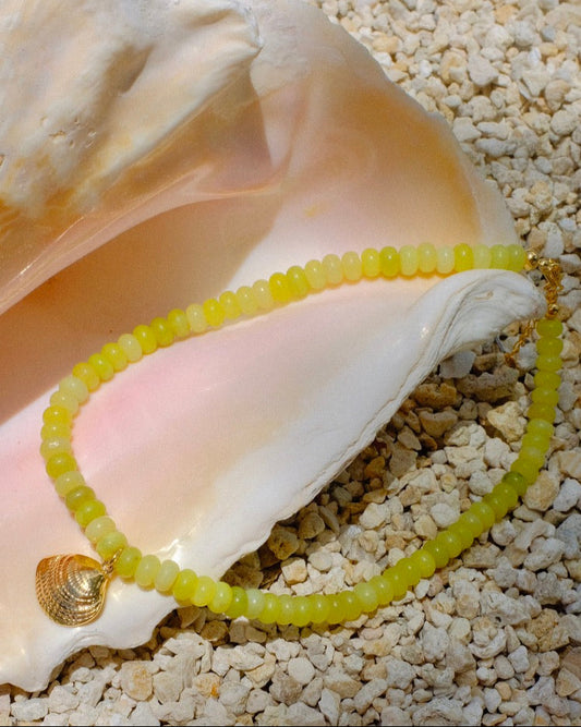 yellow beaded necklace, shell charm necklace, summer statement necklace, beach jewelry handmade, trendy gold charm necklace, layering necklace 2025, coastal accessories, handcrafted jewelry South Florida