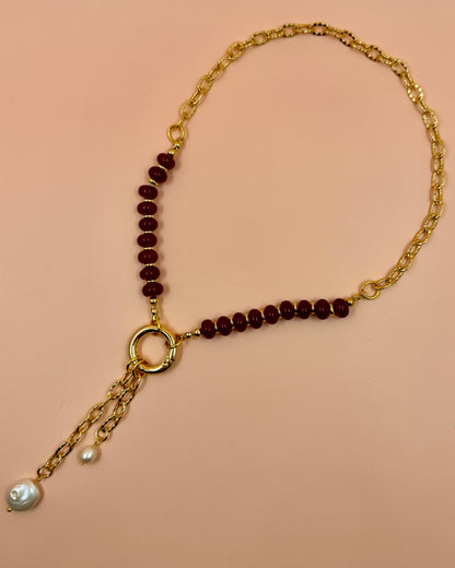 Handcrafted red gemstone necklace featuring freshwater pearls and an 18K gold plated chain. The Amara Necklace is available in 16”, 18”, and 20”.