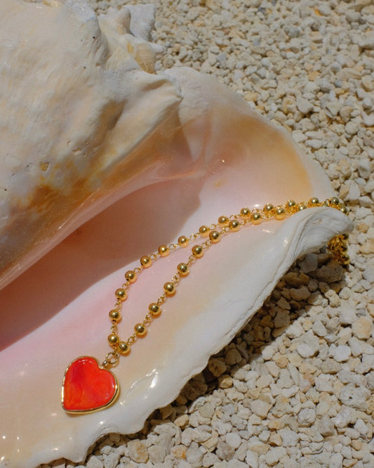 heart pendant necklace, bold gold necklace, colorful charm necklace, trendy heart jewelry 2025, statement necklace for summer, handmade Miami jewelry, red heart necklace, resin pendant necklace