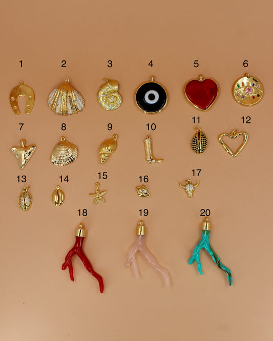 Handmade beaded necklaces in navy blue, green, yellow and orange with gold sailor clasps for interchangeable charms, customizable coastal jewelry by Cuya.