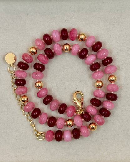 Handcrafted pink and red gemstone necklace with high-quality 18K gold plated beads and findings. The Capri Necklace adds a bold pop of color.